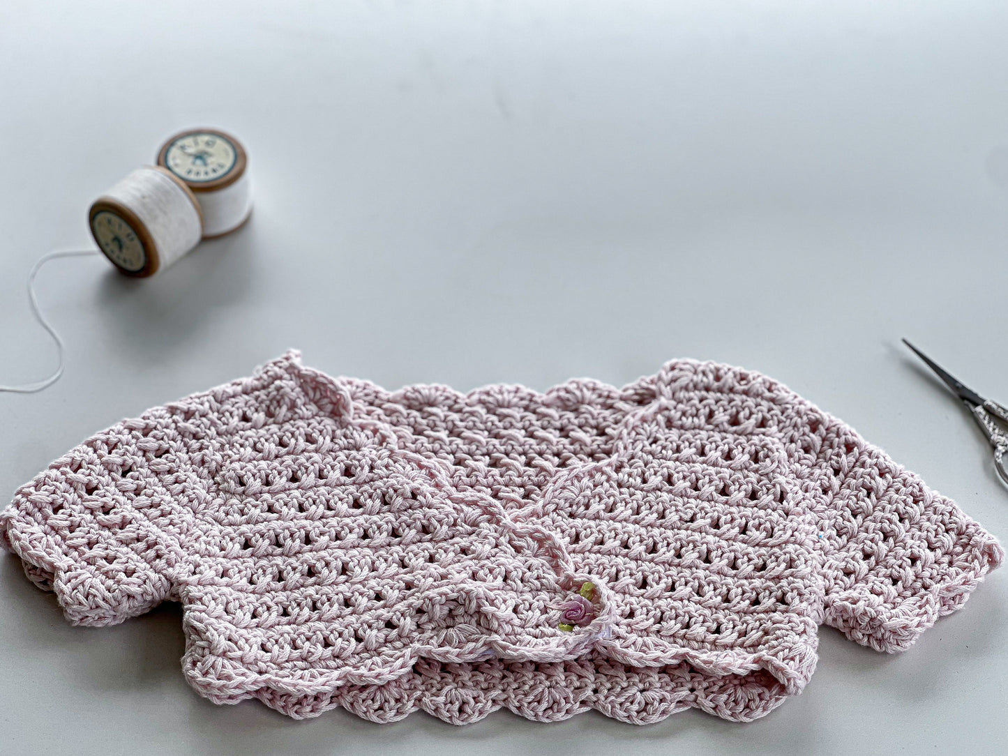 Pink cropped, cap sleeve crochet jersey (6-18 months)